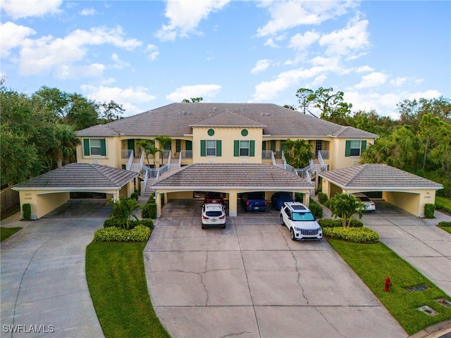 view of front facade with a carport and a porch