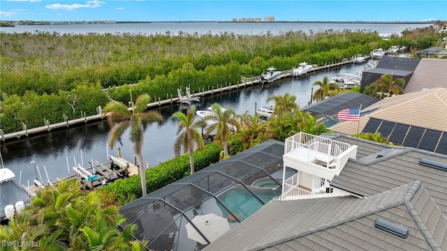 drone / aerial view featuring a water view