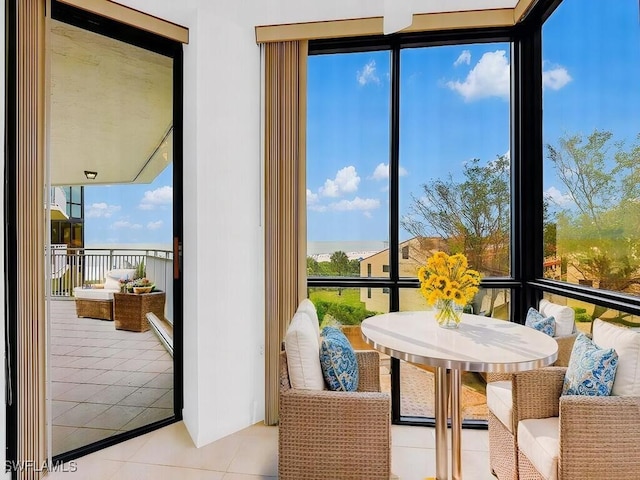 sunroom featuring a wealth of natural light