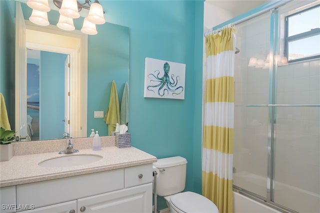 full bathroom with toilet, a chandelier, vanity, and shower / bathtub combination with curtain