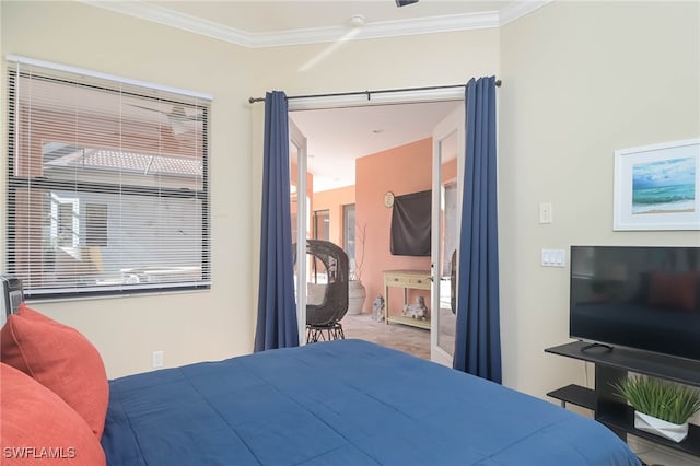 bedroom featuring crown molding