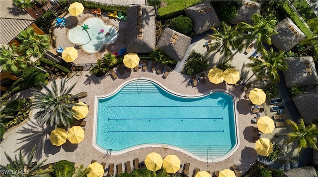 view of swimming pool with a patio