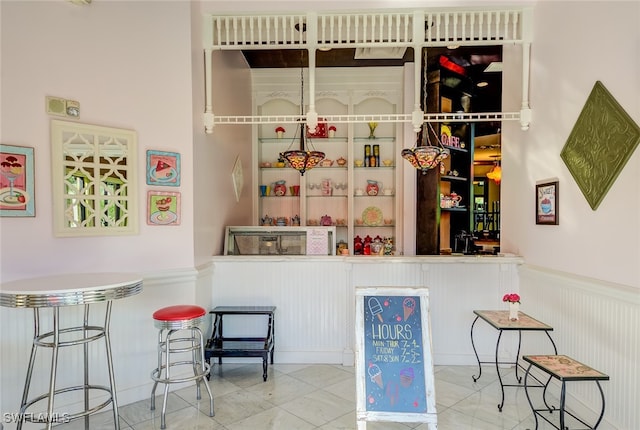 bar with tile patterned floors