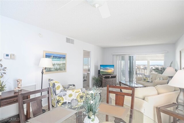 6900 Estero Blvd Unit 701, Fort Myers Beach, FL 33931 - living area featuring a textured ceiling and visible vents
