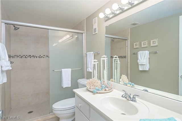 6900 Estero Blvd Unit 701, Fort Myers Beach, FL 33931 - bathroom with vanity, a stall shower, visible vents, and toilet
