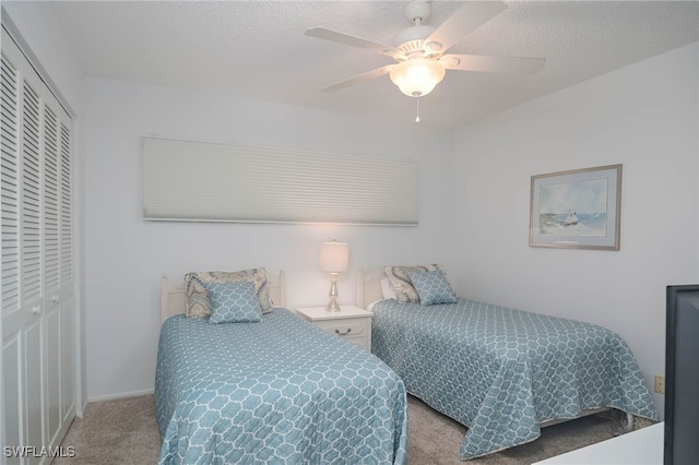 6900 Estero Blvd Unit 701, Fort Myers Beach, FL 33931 - bedroom with a closet, a ceiling fan, and carpet flooring