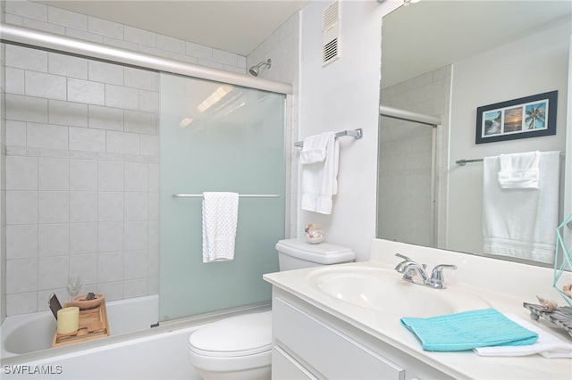 6900 Estero Blvd Unit 701, Fort Myers Beach, FL 33931 - bathroom with vanity, toilet, and shower / bath combination with glass door