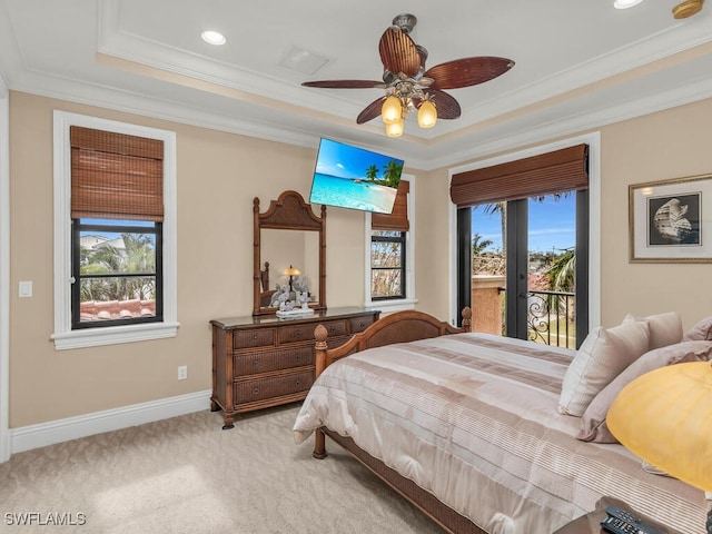 carpeted bedroom featuring multiple windows, ceiling fan, crown molding, and access to exterior