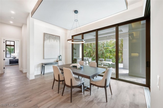 3540 Crayton Rd, Naples, FL 34103 - dining space featuring baseboards, light wood-style flooring, and recessed lighting