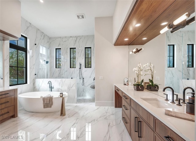 bathroom with vanity, plus walk in shower, and tile walls