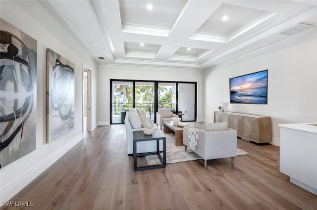 living room with beamed ceiling, light wood-type flooring, and coffered ceiling