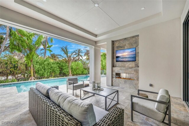 3540 Crayton Rd, Naples, FL 34103 - view of patio / terrace with an outdoor living space and an outdoor pool