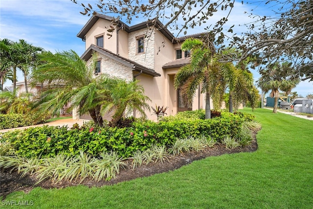 view of property exterior with a lawn