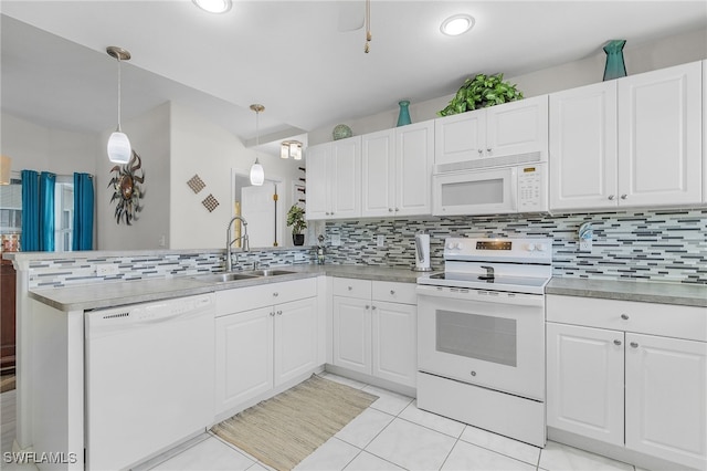 kitchen with white cabinetry, kitchen peninsula, pendant lighting, and white appliances