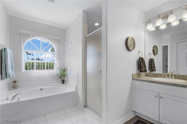 bathroom with vanity, shower with separate bathtub, and tile patterned flooring