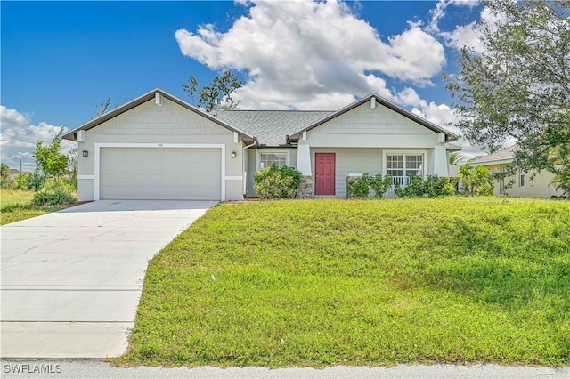 view of front facade featuring a front lawn and a garage