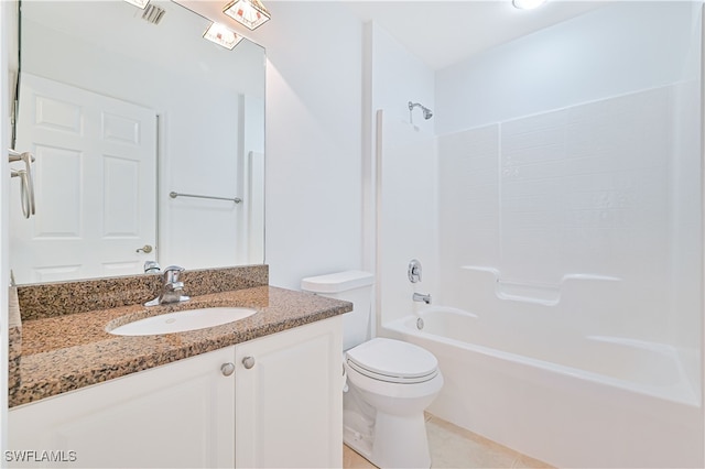 full bathroom featuring vanity, tile patterned flooring, toilet, and tub / shower combination