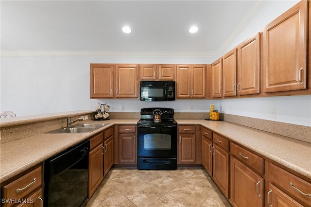 kitchen with black appliances, crown molding, and sink