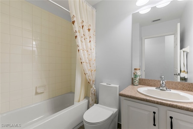 full bathroom featuring vanity, toilet, and shower / bath combo with shower curtain