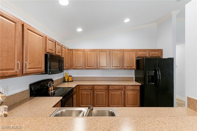 kitchen with crown molding, sink, black appliances, and vaulted ceiling