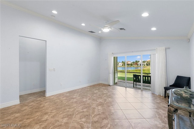 interior space featuring ceiling fan, crown molding, and vaulted ceiling