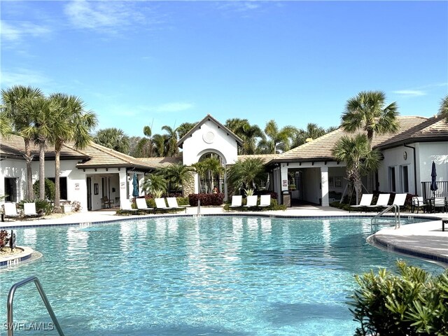 view of swimming pool featuring a patio area