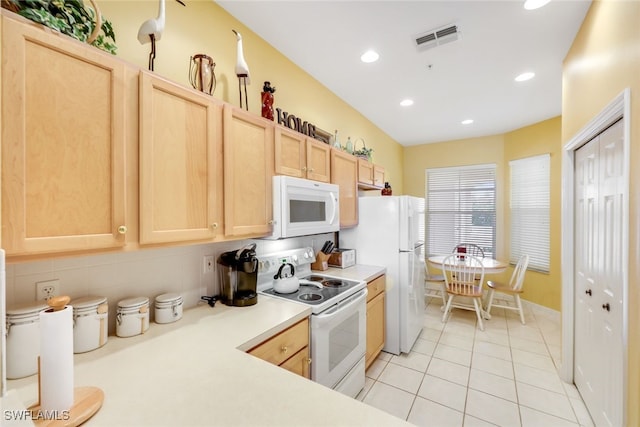 kitchen with decorative backsplash, light brown cabinets, white appliances, and light tile patterned flooring