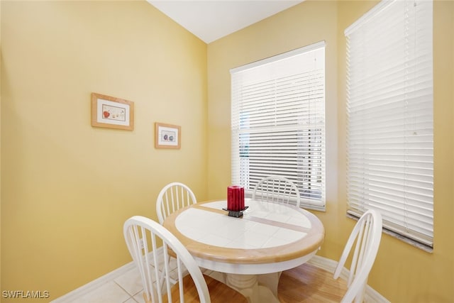 dining room featuring light tile patterned floors