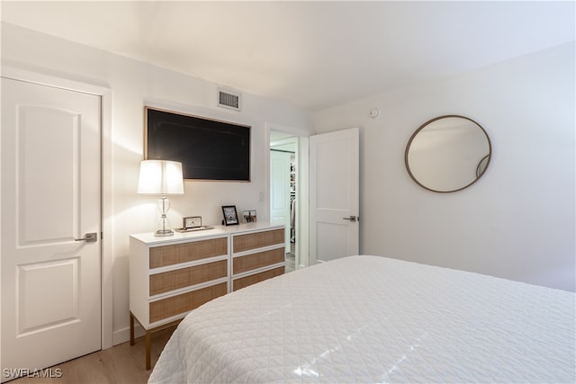 bedroom featuring hardwood / wood-style flooring