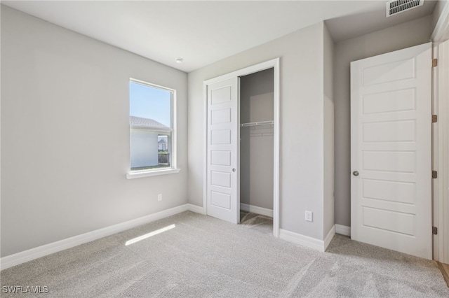 44284 Frontier Dr, Punta Gorda, FL 33982 - unfurnished bedroom featuring carpet flooring, baseboards, and a closet
