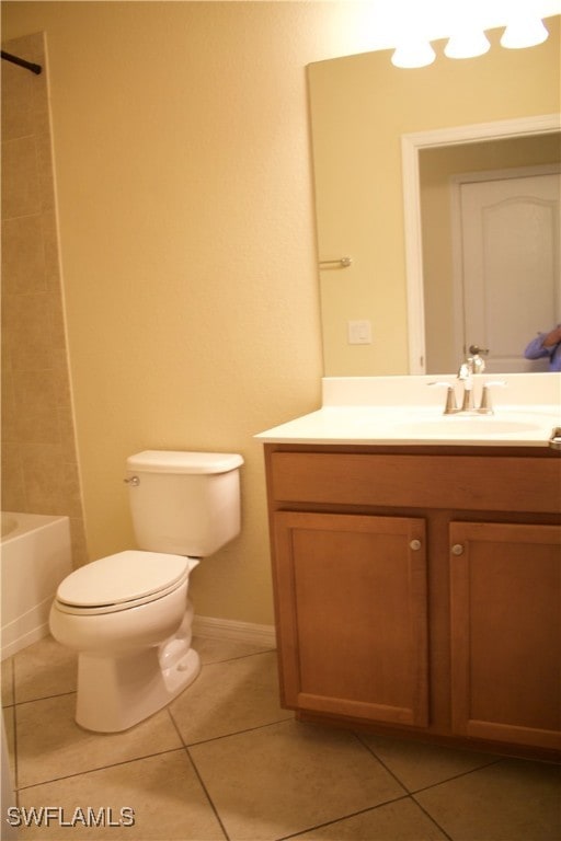 14549 Lanier Ct, Naples, FL 34114 - full bath with tile patterned flooring, vanity, and  shower combination