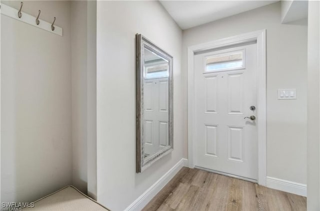 foyer with light hardwood / wood-style floors