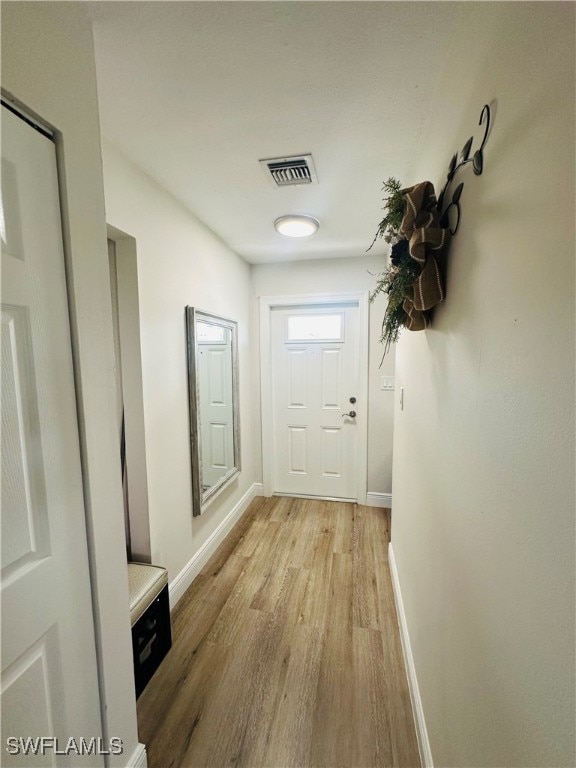 entryway with light wood-type flooring