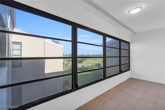 unfurnished sunroom featuring a healthy amount of sunlight