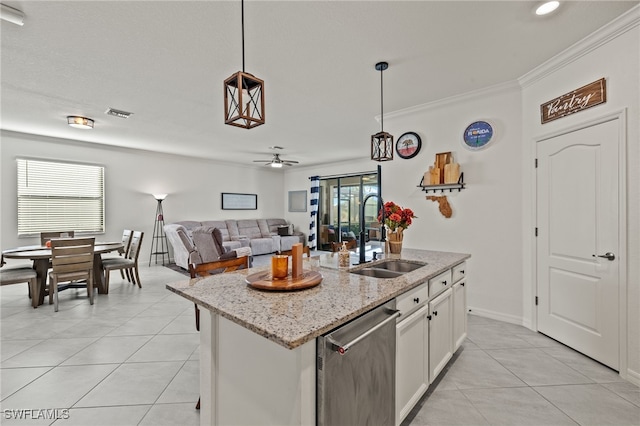 kitchen featuring sink, white cabinetry, decorative light fixtures, dishwasher, and a kitchen island with sink