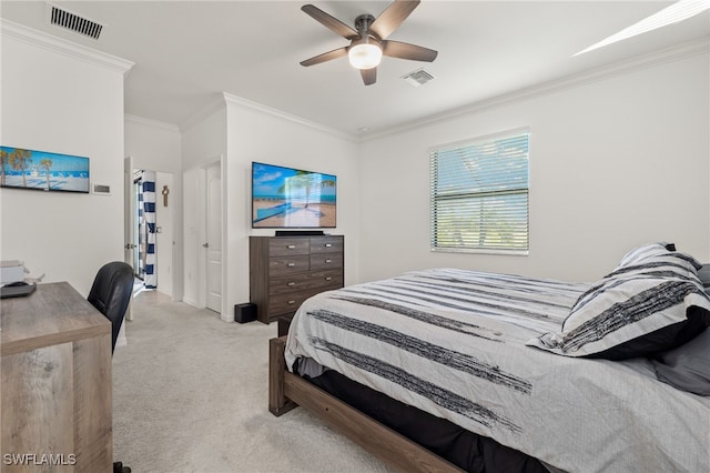 carpeted bedroom with crown molding and ceiling fan