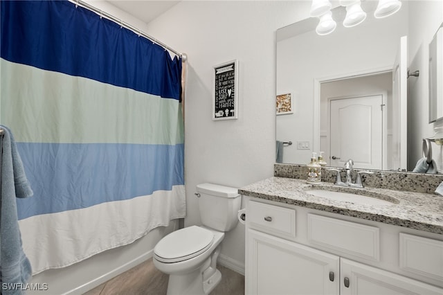 full bathroom with vanity, shower / bath combination with curtain, and toilet