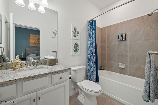 full bathroom with vanity, shower / bath combination with curtain, tile patterned floors, and toilet