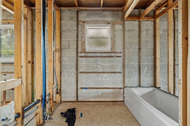 bathroom with a tub