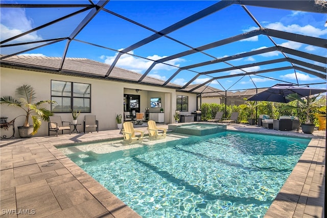 view of swimming pool with a patio, ceiling fan, an in ground hot tub, and glass enclosure