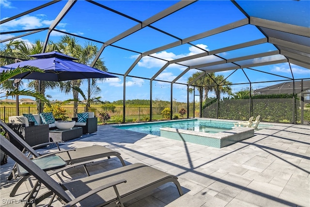 pool with an outdoor living space, fence, an in ground hot tub, a lanai, and a patio area