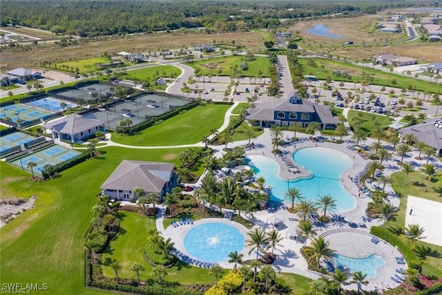 birds eye view of property with a residential view