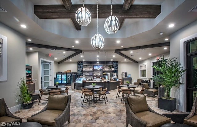 dining space featuring beamed ceiling, recessed lighting, and visible vents