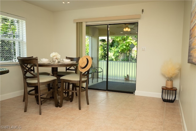 dining area with a healthy amount of sunlight and light tile patterned flooring