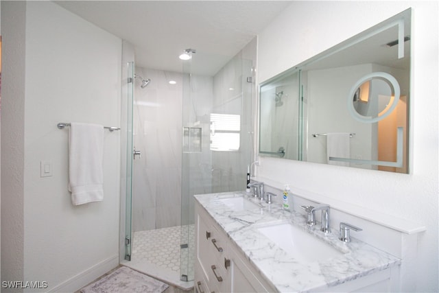 bathroom with vanity and walk in shower