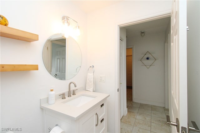 bathroom with vanity and tile patterned flooring