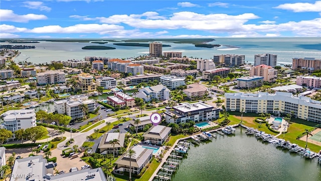 birds eye view of property featuring a water view