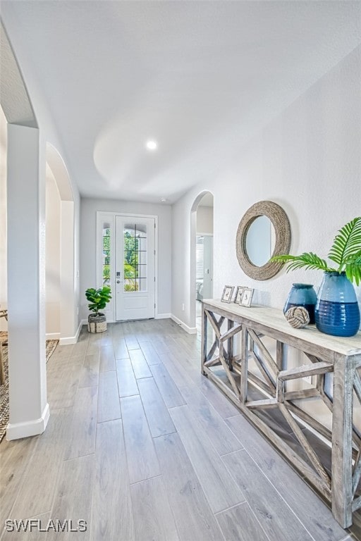 foyer featuring light wood-type flooring