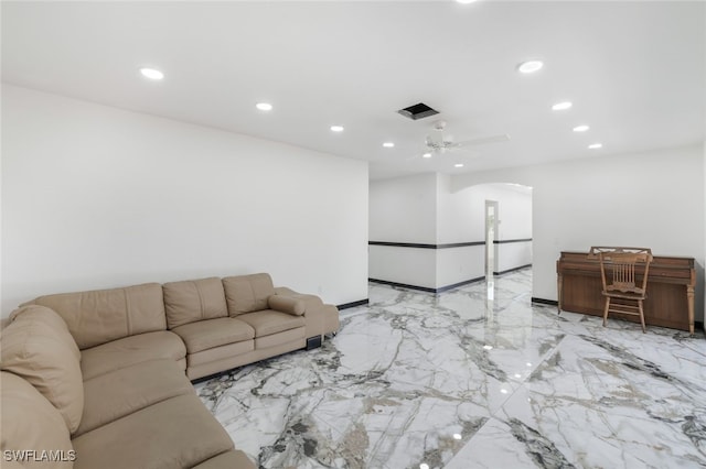 living room with ceiling fan