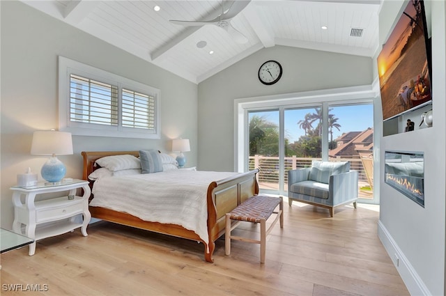 bedroom with light hardwood / wood-style floors, ceiling fan, access to exterior, high vaulted ceiling, and beamed ceiling